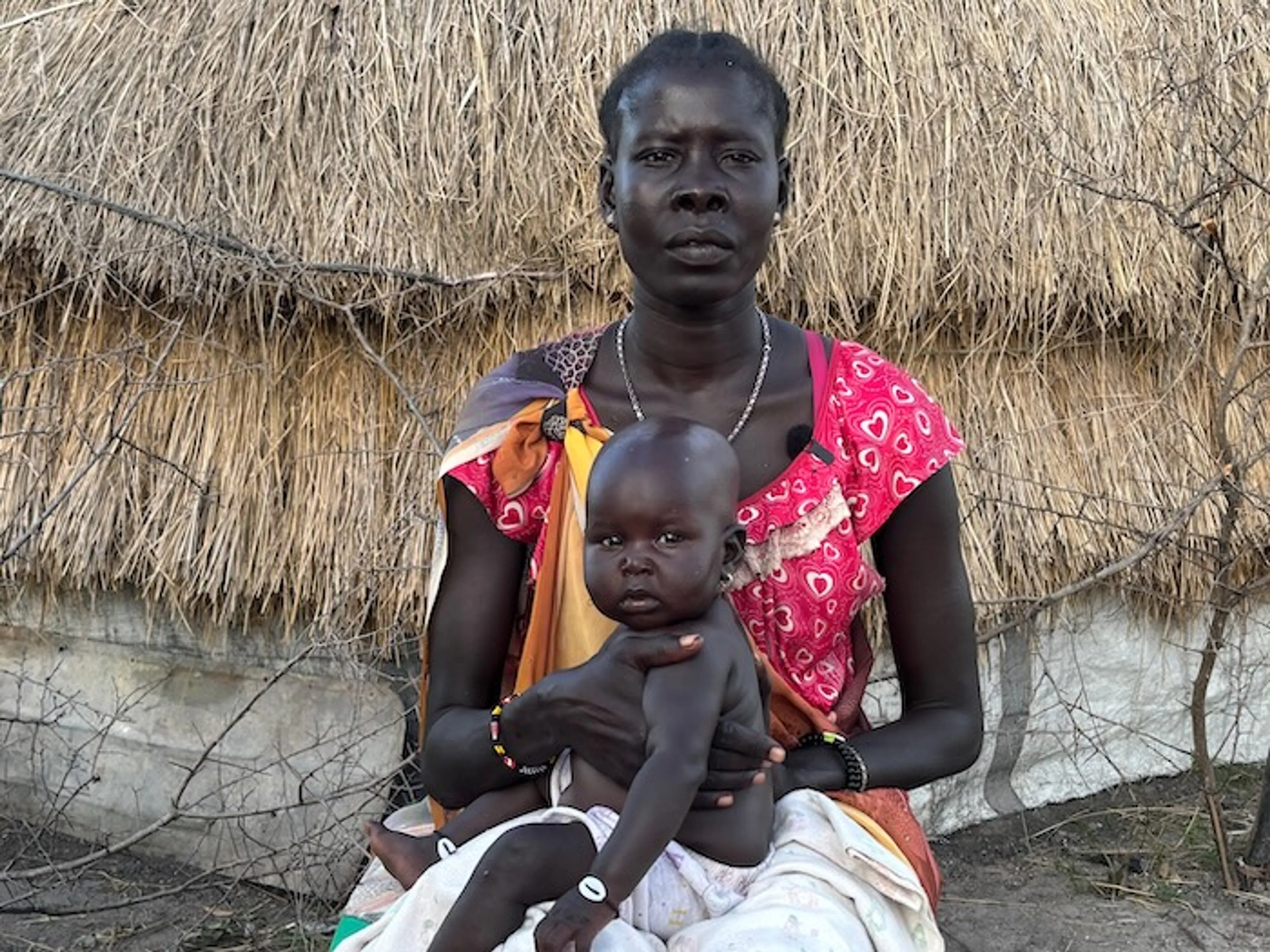 Vrouw met baby in Zuid-Soedan